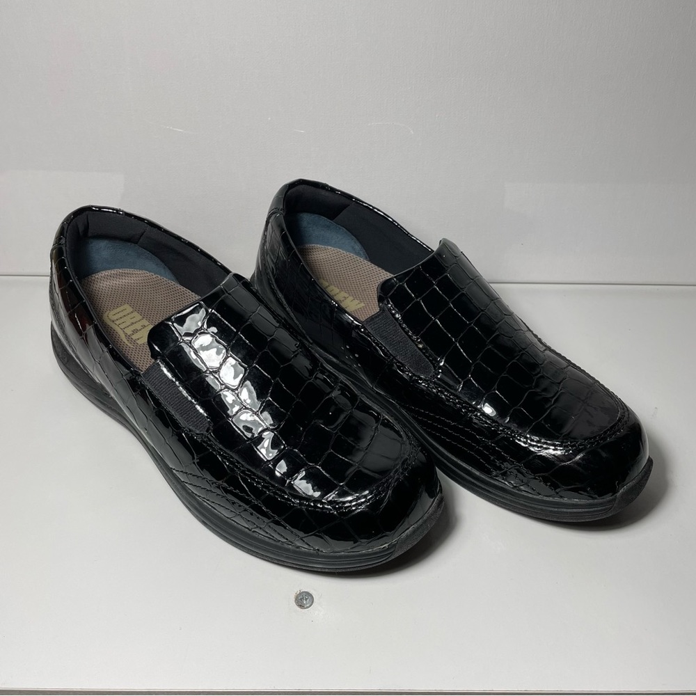Black snake print loafers